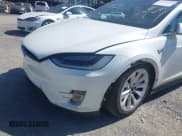 ✅ 2016 Tesla Model X P90D • VIN: 5YJXCAE46GF030106 • Lot: 41766079. Listed on IAAI with Not provided. Free auction sales archive from the USA and detailed vehicle history report at DreamBid. Image 18.