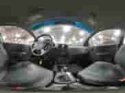 2006 Chevrolet Aveo LS z VIN KL1TD56646B553734, wystawiony jako Copart lot #88496205 z przebiegiem 156 610 mil mil oraz Czysty tytuł • Clean title. Historia ofert i sprzedaży dostępna na DreamBid. Obrazek 13.