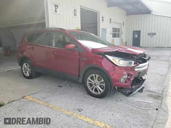 ✅ 2018 Ford Escape SE • VIN: 1FMCU9GDXJUB51495 • Lot: 69274145. Wystawiony na Copart z przebiegiem 72 016 mil. Bezpłatny archiwum sprzedaży aukcyjnych z USA i szczegółowy raport historii pojazdu na DreamBid. Zdjęcie 15.