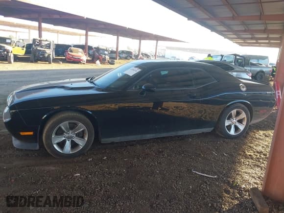 ✅ 2013 Dodge Challenger SXT • VIN: 2C3CDYAG4DH616155 • Lot: 43486536. Listed on IAAI with 129,574 mi. Free auction sales archive from the USA and detailed vehicle history report at DreamBid. Image 14.