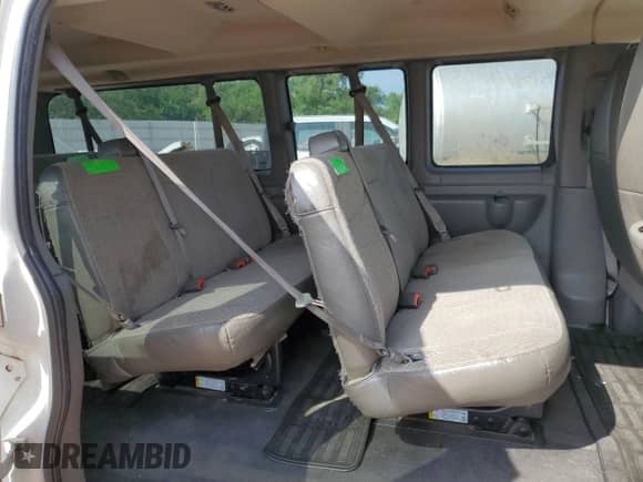 2012 Chevrolet Express Passenger 1LT с VIN 1GAZG1FG4C1190180, выставлен на аукционе Copart как лот 60436354 с пробегом 58 412 миль миль и Списание • Salvage title. История ставок и продаж доступна на DreamBid. Изображение 11.