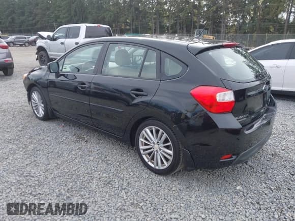 ✅ 2012 Subaru Impreza Premium • VIN: JF1GPAD64CH215441 • Lot: 43319709. Listed on IAAI with 105,917 mi. Free auction sales archive from the USA and detailed vehicle history report at DreamBid. Image 3.