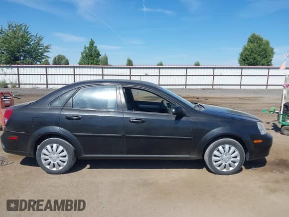 ✅ 2008 Suzuki Forenza • VIN: KL5JD56Z88K931136 • Лот: 42639104. Опубликован ранее на IAAI с пробегом 88 781 миль. Бесплатный доступ к архиву аукционных продаж из США и подробный отчёт об истории автомобиля на DreamBid. Изображение 13.