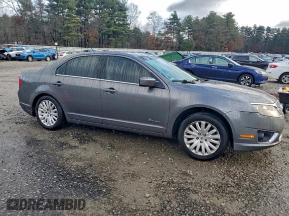 ✅ 2010 Ford Fusion Hybrid • VIN: 3FADP0L39AR166995 • Lot: 94321235. Wystawiony na Copart z przebiegiem 93 333 mil. Bezpłatny archiwum sprzedaży aukcyjnych z USA i szczegółowy raport historii pojazdu na DreamBid. Zdjęcie 4.
