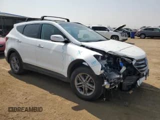 ✅ 2017 Hyundai Santa Fe 2.4L • VIN: 5XYZUDLBXHG427112 • Лот: 64670994. Опубликован ранее на Copart с пробегом 76 720 миль. Бесплатный доступ к архиву аукционных продаж из США и подробный отчёт об истории автомобиля на DreamBid. Изображение 4.