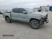✅ 2023 Toyota Tacoma TRD Sport • VIN: 3TMCZ5AN2PM602738 • Lot: 82590385. Listed on Copart with 34,093 mi. Free auction sales archive from the USA and detailed vehicle history report at DreamBid. Image 4.