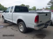 ✅ 1999 Ford F-150 • VIN: 1FTRX18W5XNB87105 • Lot: 43325057. Listed on IAAI with 159,328 mi. Free auction sales archive from the USA and detailed vehicle history report at DreamBid. Image 3.