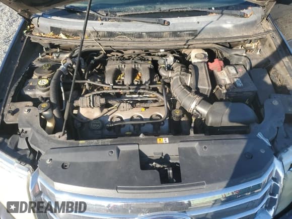 ✅ 2008 Ford Taurus X SEL • VIN: 1FMDK02WX8GA21286 • Лот: 75031714. Опубликован ранее на Copart с пробегом 185 874 миль. Бесплатный доступ к архиву аукционных продаж из США и подробный отчёт об истории автомобиля на DreamBid. Изображение 13.