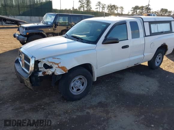 2007 Dodge Dakota ST с VIN 1D7HW22K17S202605, выставлен на аукционе IAAI как лот 41322519 с пробегом 199 626 миль миль и . История ставок и продаж доступна на DreamBid. Изображение 2.