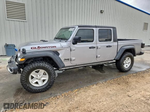 ✅ 2020 Jeep Gladiator Sport S • VIN: 1C6HJTAG5LL130072 • Лот: 95541605. Опубликован ранее на Copart с пробегом 88 577 миль. Бесплатный доступ к архиву аукционных продаж из США и подробный отчёт об истории автомобиля на DreamBid. Изображение 1.