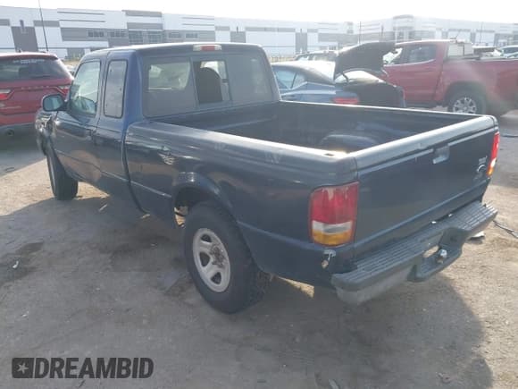 ✅ 1999 Ford Ranger XL • VIN: 1FTYR14VXXPC05122 • Lot: 43719302. Wystawiony na IAAI z przebiegiem 410 039 mil. Bezpłatny archiwum sprzedaży aukcyjnych z USA i szczegółowy raport historii pojazdu na DreamBid. Zdjęcie 3.