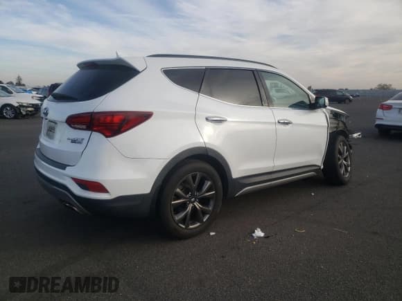 ✅ 2017 Hyundai Santa Fe Ultimate • VIN: 5XYZWDLA0HG496733 • Лот: 77305753. Опубликован ранее на Copart с пробегом 66 774 миль. Бесплатный доступ к архиву аукционных продаж из США и подробный отчёт об истории автомобиля на DreamBid. Изображение 3.