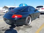 ✅ 1999 Porsche 911 • VIN: WP0CA2999XS650760 • Lot: 43538246. Listed on IAAI with 71,207 mi. Free auction sales archive from the USA and detailed vehicle history report at DreamBid. Image 4.