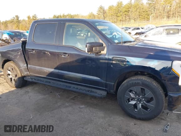 ✅ 2023 Ford F-150 Lightning Pro • VIN: 1FT6W1EV7PWG33511 • Lot: 41761149. Listed on IAAI with 10,501 mi. Free auction sales archive from the USA and detailed vehicle history report at DreamBid. Image 13.