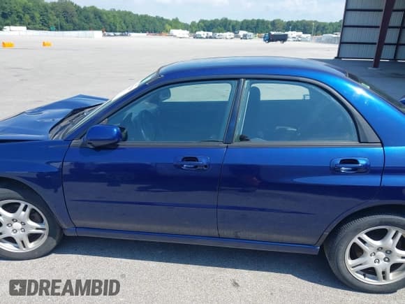 ✅ 2002 Subaru Impreza RS • VIN: JF1GD675X2H521776 • Lot: 42840689. Listed on IAAI with 116,936 mi. Free auction sales archive from the USA and detailed vehicle history report at DreamBid. Image 14.