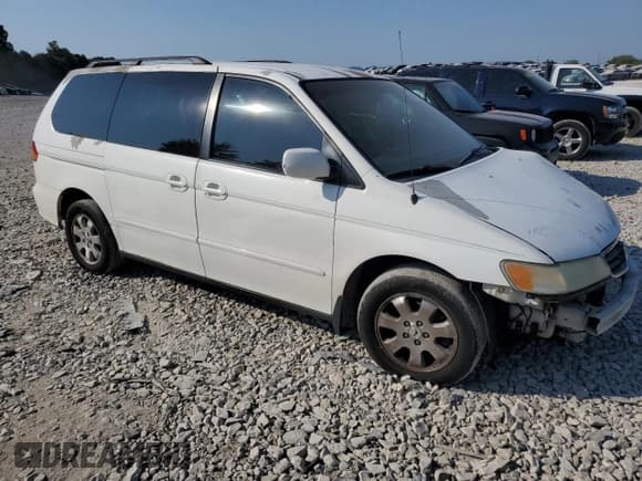 ✅ 2004 Honda Odyssey EX-L • VIN: 5FNRL18944B065139 • Lot: 69622564. Listed on Copart with 244,662 mi. Free auction sales archive from the USA and detailed vehicle history report at DreamBid. Image 4.