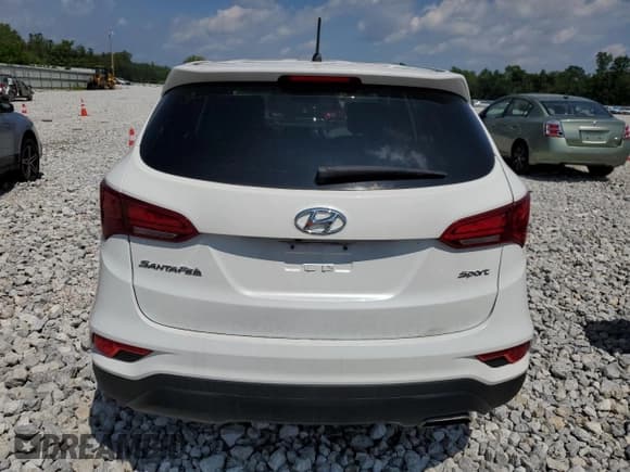 ✅ 2018 Hyundai Santa Fe 2.4L • VIN: 5XYZTDLBXJG567668 • Лот: 62925933. Опубликован ранее на Copart с пробегом 86 351 миль. Бесплатный доступ к архиву аукционных продаж из США и подробный отчёт об истории автомобиля на DreamBid. Изображение 6.