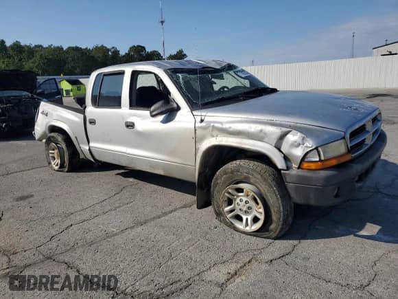 2004 Dodge Dakota Sport с VIN 1D7HG38N34S770063, выставлен на аукционе Copart как лот 71457315 с пробегом 320 703 миль миль и Списание • Salvage title. История ставок и продаж доступна на DreamBid. Изображение 4.