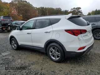 ✅ 2017 Hyundai Santa Fe 2.4L • VIN: 5NMZUDLB2HH007530 • Лот: 89575685. Опубликован ранее на Copart с пробегом 180 371 миль. Бесплатный доступ к архиву аукционных продаж из США и подробный отчёт об истории автомобиля на DreamBid. Изображение 2.