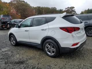✅ 2017 Hyundai Santa Fe 2.4L • VIN: 5NMZUDLB2HH007530 • Лот: 89575685. Опубликован ранее на Copart с пробегом 180 371 миль. Бесплатный доступ к архиву аукционных продаж из США и подробный отчёт об истории автомобиля на DreamBid. Изображение 2.