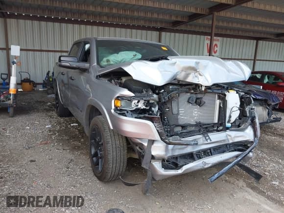 ✅ 2025 Ram 1500 Laramie • VIN: 1C6SRFJP7SN627191 • Lot: 42643293. Listed on IAAI with 7,406 mi. Free auction sales archive from the USA and detailed vehicle history report at DreamBid. Image 1.