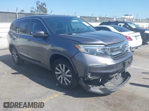 ✅ 2019 Honda Pilot EX-L • VIN: 5FNYF5H5XKB025457 • Lot: 42153274. Listed on IAAI with 71,956 mi. Free auction sales archive from the USA and detailed vehicle history report at DreamBid. Image 1.