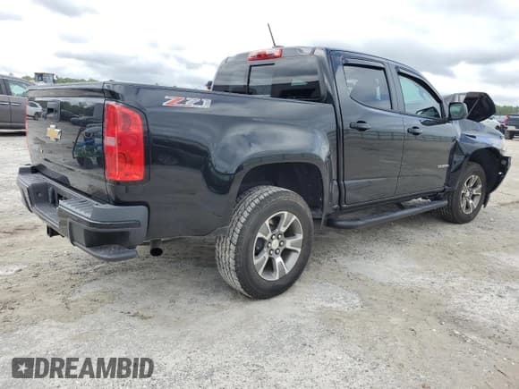 ✅ 2018 Chevrolet Colorado 4WD Z71 • VIN: 1GCGTDEN2J1213450 • Лот: 70975404. Опубликован ранее на Copart с пробегом 46 307 миль. Бесплатный доступ к архиву аукционных продаж из США и подробный отчёт об истории автомобиля на DreamBid. Изображение 3.
