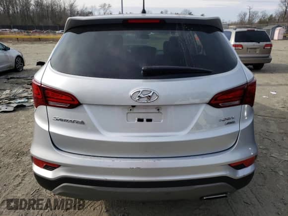 ✅ 2018 Hyundai Santa Fe 2.4L • VIN: 5XYZTDLB1JG541444 • Lot: 42704343. Wystawiony na Copart z przebiegiem 85 924 mil mil. Skorzystaj z bezpłatnego archiwum sprzedaży aukcyjnych z USA i zobacz szczegółowy raport historii pojazdu na DreamBid. Zdjęcie 6.