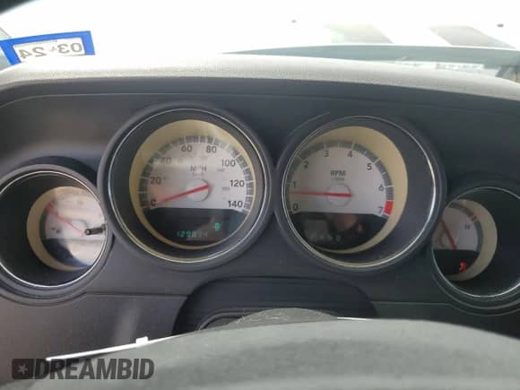 2010 Dodge Challenger SE z VIN 2B3CJ4DV1AH321342, wystawiony jako Copart lot #67499744 z przebiegiem 129 834 mil mil oraz Szkoda całkowita • Salvage title. Historia ofert i sprzedaży dostępna na DreamBid. Obrazek 9.