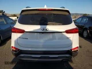 ✅ 2020 Hyundai Santa Fe Limited • VIN: 5NMS53AA2LH145175 • Lot: 80692583. Wystawiony na Copart z przebiegiem 62 931 mil. Bezpłatny archiwum sprzedaży aukcyjnych z USA i szczegółowy raport historii pojazdu na DreamBid. Zdjęcie 6.