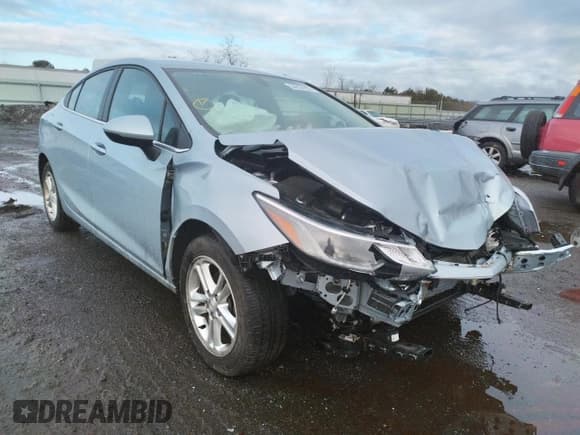 ✅ 2018 Chevrolet Cruze LT • VIN: 1G1BE5SM3J7101896 • Lot: 34337922. Listed on Copart with 52,303 mi. Free auction sales archive from the USA and detailed vehicle history report at DreamBid. Image 1.