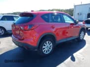 ✅ 2014 Mazda CX-5 Touring • VIN: JM3KE4CY1E0333406 • Lot: 43266877. Wystawiony na IAAI z przebiegiem 164 363 mil. Bezpłatny archiwum sprzedaży aukcyjnych z USA i szczegółowy raport historii pojazdu na DreamBid. Zdjęcie 4.
