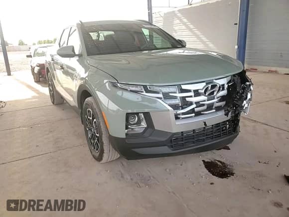 2023 Hyundai Santa Cruz SEL with VIN 5NTJC4AE8PH044985, listed as a Copart auction lot 84774144 with 11,643 mi miles and Salvage title. Bid and sale history available at DreamBid. Image 12.