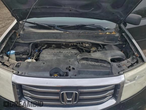 ✅ 2012 Honda Pilot EX-L • VIN: 5FNYF4H64CB053744 • Lot: 95992465. Listed on Copart with 259,449 mi. Free auction sales archive from the USA and detailed vehicle history report at DreamBid. Image 12.