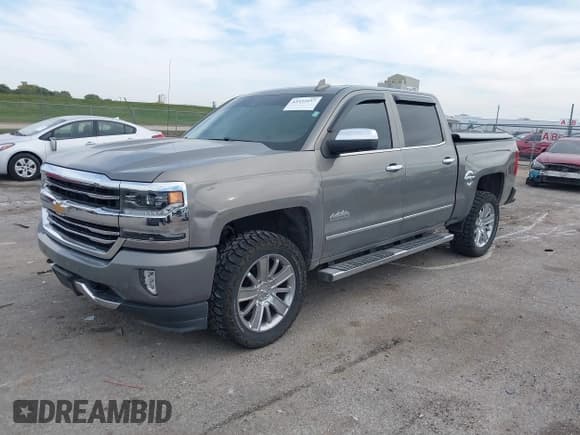 ✅ 2017 Chevrolet Silverado 1500 High Country • VIN: 3GCUKTEC3HG312255 • Лот: 43332157. Опубликован ранее на IAAI с пробегом 54 155 миль. Бесплатный доступ к архиву аукционных продаж из США и подробный отчёт об истории автомобиля на DreamBid. Изображение 18.