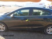 ✅ 2018 Chevrolet Cruze LT • VIN: 3G1BE6SM7JS645177 • Lot: 43475388. Listed on IAAI with 107,539 mi. Free auction sales archive from the USA and detailed vehicle history report at DreamBid. Image 14.