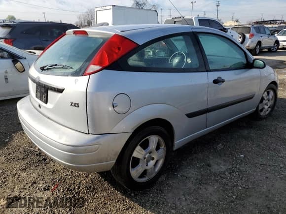 ✅ 2003 Ford Focus ZX3 • VIN: 3FAFP31Z33R178841 • Lot: 43453095. Listed on Copart with 187,698 mi. Free auction sales archive from the USA and detailed vehicle history report at DreamBid. Image 3.