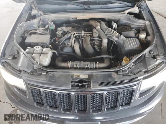 ✅ 2014 Jeep Grand Cherokee • VIN: 1C4RJEJM8EC424373 • Lot: 72256674. Listed on Copart with 128,998 mi. Free auction sales archive from the USA and detailed vehicle history report at DreamBid. Image 11.