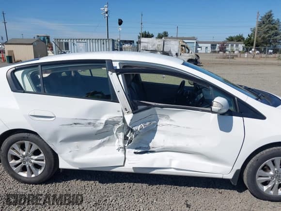 ✅ 2014 Honda Insight EX • VIN: JHMZE2H71ES002369 • Лот: 42455582. Опубликован ранее на IAAI с пробегом 114 331 миль. Бесплатный доступ к архиву аукционных продаж из США и подробный отчёт об истории автомобиля на DreamBid. Изображение 6.