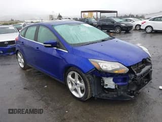 ✅ 2014 Ford Focus Titanium • VIN: 1FADP3N23EL139365 • Lot: 43758493. Listed on IAAI with 96,300 mi. Free auction sales archive from the USA and detailed vehicle history report at DreamBid. Image 1.