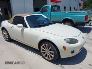 ✅ 2006 Mazda MX-5 Miata Sport • VIN: JM1NC25F660102949 • Lot: 42879898. Listed on IAAI with 138,005 mi. Free auction sales archive from the USA and detailed vehicle history report at DreamBid. Image 1.
