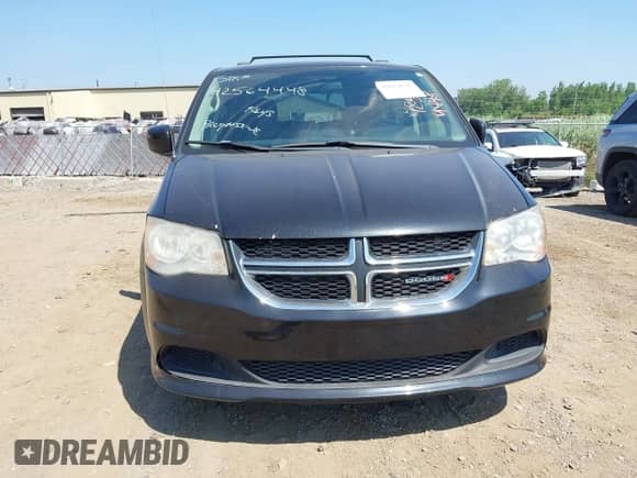 2014 Dodge Grand Caravan SXT z VIN 2C4RDGCG8ER137617, wystawiony jako IAAI lot #42818038 z przebiegiem 124 007 mil mil oraz . Historia ofert i sprzedaży dostępna na DreamBid. Obrazek 6.