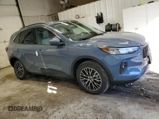 ✅ 2024 Ford Escape PHEV • VIN: 1FMCU0E16RUA54777 • Lot: 86234005. Listed on Copart with 5,631 mi. Free auction sales archive from the USA and detailed vehicle history report at DreamBid. Image 4.