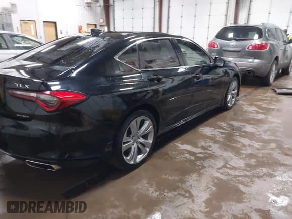 ✅ 2021 Acura TLX Technology • VIN: 19UUB6F47MA004430 • Lot: 42014497. Listed on IAAI with 98,870 mi. Free auction sales archive from the USA and detailed vehicle history report at DreamBid. Image 4.