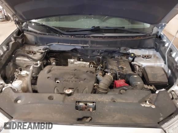 2014 Mitsubishi Outlander ES z VIN 4A4AR3AUXEE009160, wystawiony jako IAAI lot #43436869 z przebiegiem 63 766 mil mil oraz . Historia ofert i sprzedaży dostępna na DreamBid. Obrazek 10.