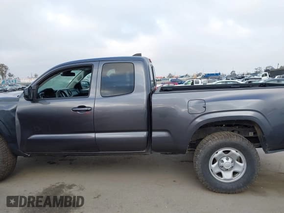 ✅ 2022 Toyota Tacoma SR • VIN: 3TYSX5EN8NT016817 • Лот: 42140136. Опубликован ранее на IAAI с пробегом 52 825 миль. Бесплатный доступ к архиву аукционных продаж из США и подробный отчёт об истории автомобиля на DreamBid. Изображение 13.