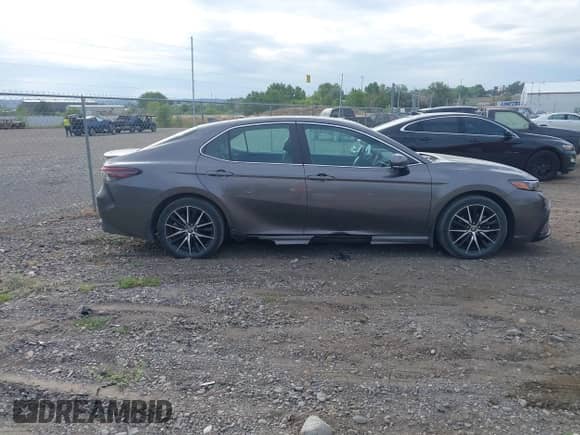 2022 Toyota Camry SE with VIN 4T1G11BK7NU049434, listed as a IAAI auction lot 43099991 with 36,395 mi miles and . Bid and sale history available at DreamBid. Image 13.