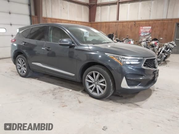 ✅ 2020 Acura RDX Technology • VIN: 5J8TC2H57LL020623 • Лот: 43669194. Опубликован ранее на IAAI с пробегом 51 057 миль. Бесплатный доступ к архиву аукционных продаж из США и подробный отчёт об истории автомобиля на DreamBid. Изображение 1.