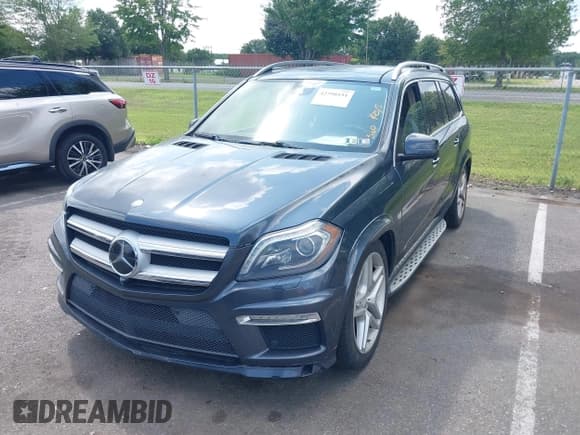 ✅ 2013 Mercedes-Benz GL 550 • VIN: 4JGDF7DE5DA180778 • Lot: 42798151. Listed on IAAI with 171,893 mi. Free auction sales archive from the USA and detailed vehicle history report at DreamBid. Image 2.