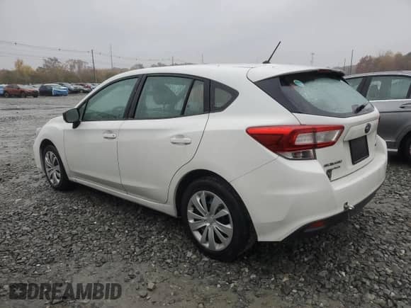 2019 Subaru Impreza with VIN 4S3GTAA64K3719591, listed as a Copart auction lot 90866265 with 130,224 mi miles and Clean title. Bid and sale history available at DreamBid. Image 2.